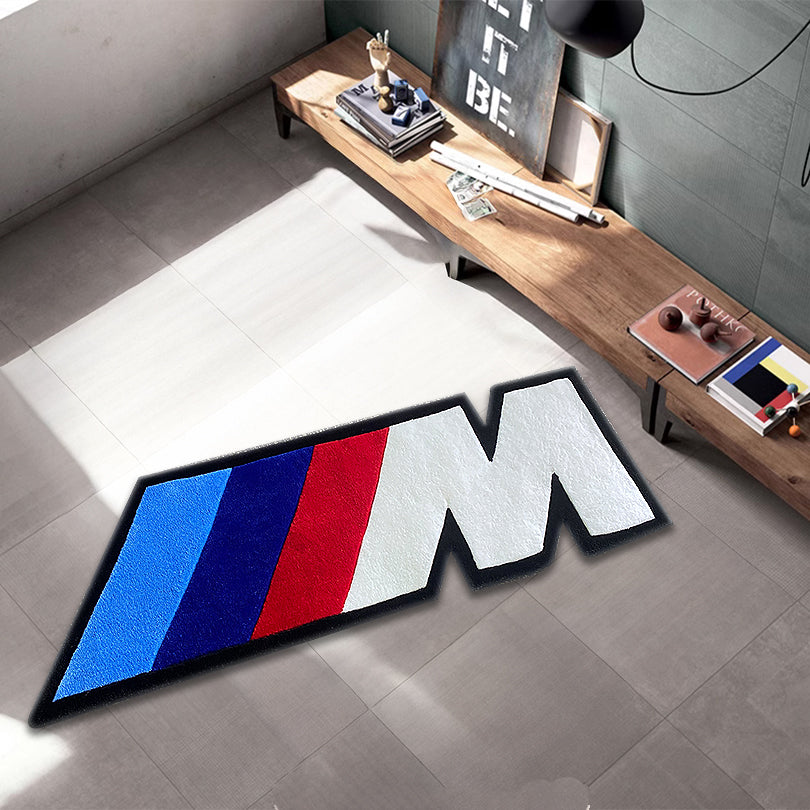 Clean M Badge Rug