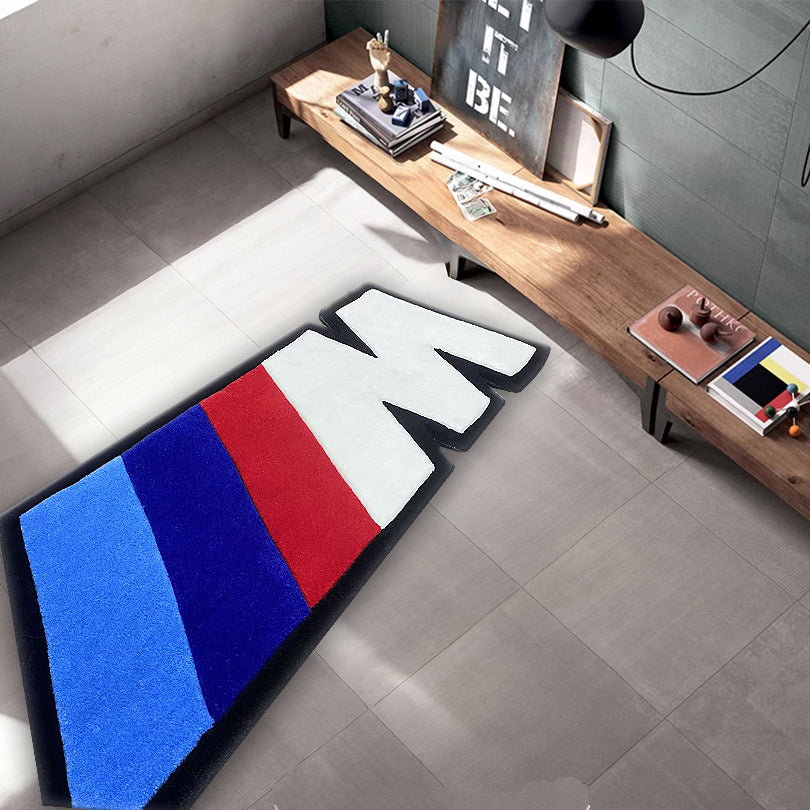 Clean M Badge Rug